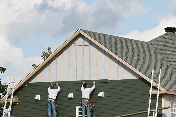Professional Emergency Siding Repair technician working in Dunlevy, PA